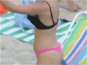 pink bathing suit fledgling bra-less voyeur Beach femmes