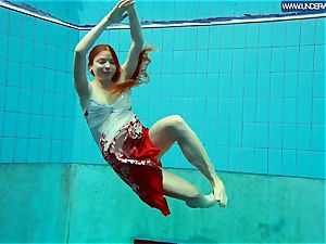 sizzling polish red-haired swimming in the pool